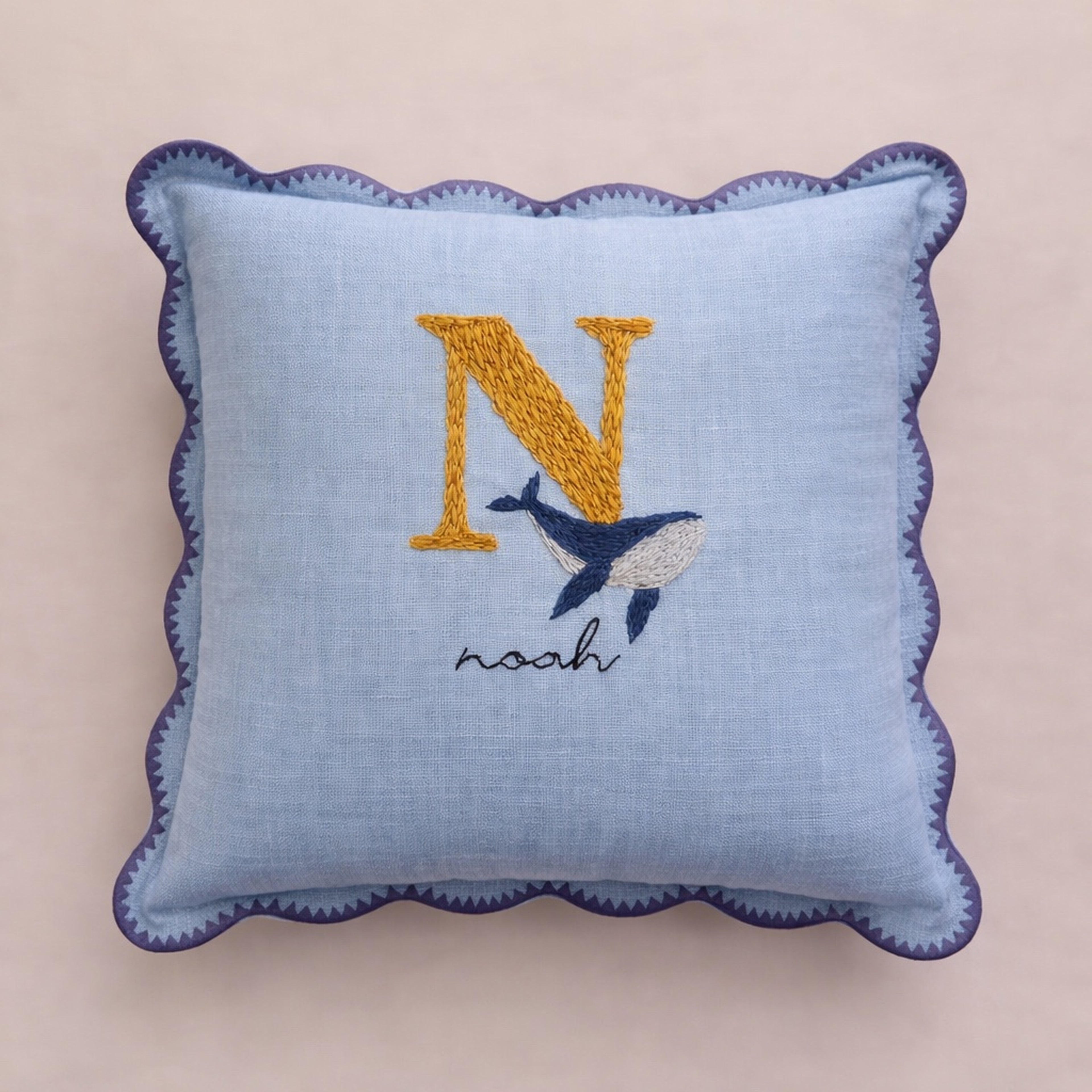 Light blue pillow with embroidered letter, whale, and name - personalised baby / toddler gift.