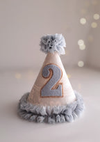 Party hat with number 2 on a light background.