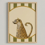 Framed artwork of a leopard on a striped background.