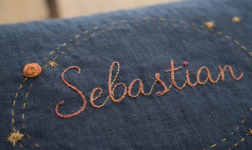 Navy personalised space themed cushion close up